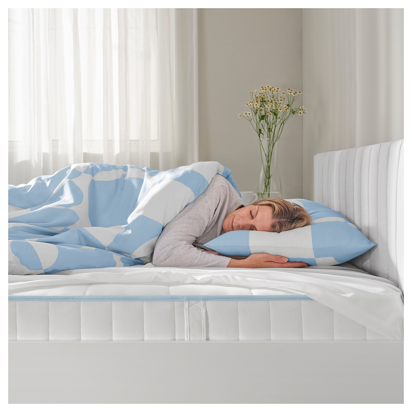 Title: The Versatile and Affordable Ikea Down Comforter: An Essential for a Cozy Sleep Environment