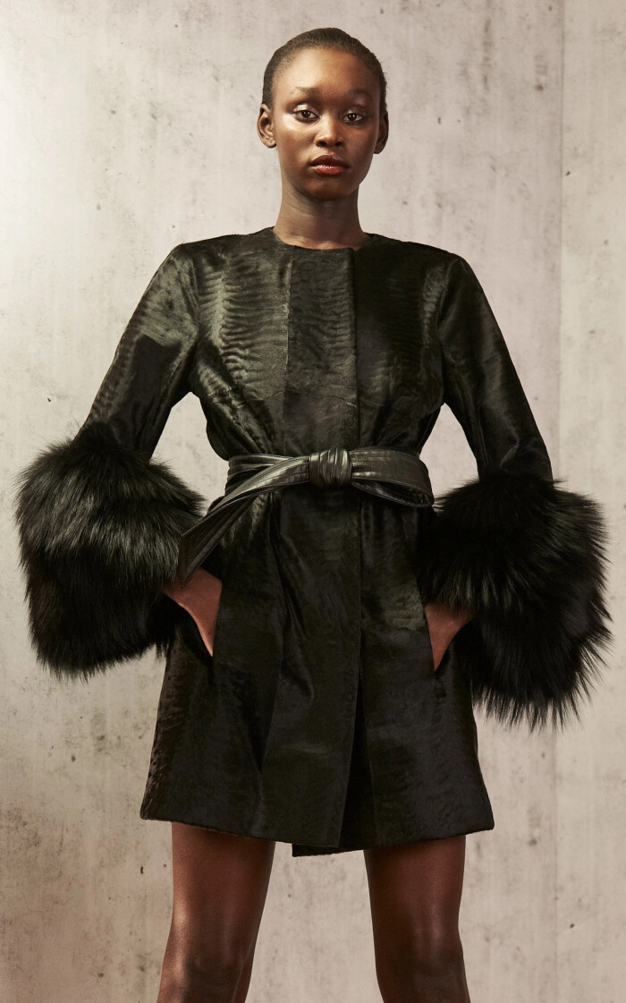 Title: The Allure of Black: Embracing the Beauty of Down Jackets and Duvets