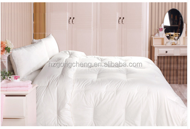 Title: The Opulence of White Magnolia Down Cotton Quilt - A Masterpiece of Comfort and Luxury